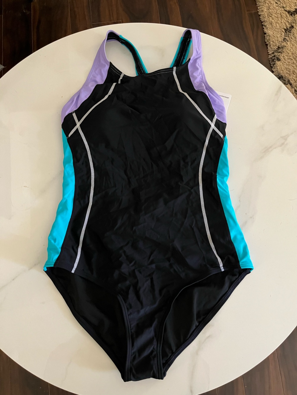 Women's Black Colorblock One-Piece Swimsuit with Turquoise and Lavender Accents